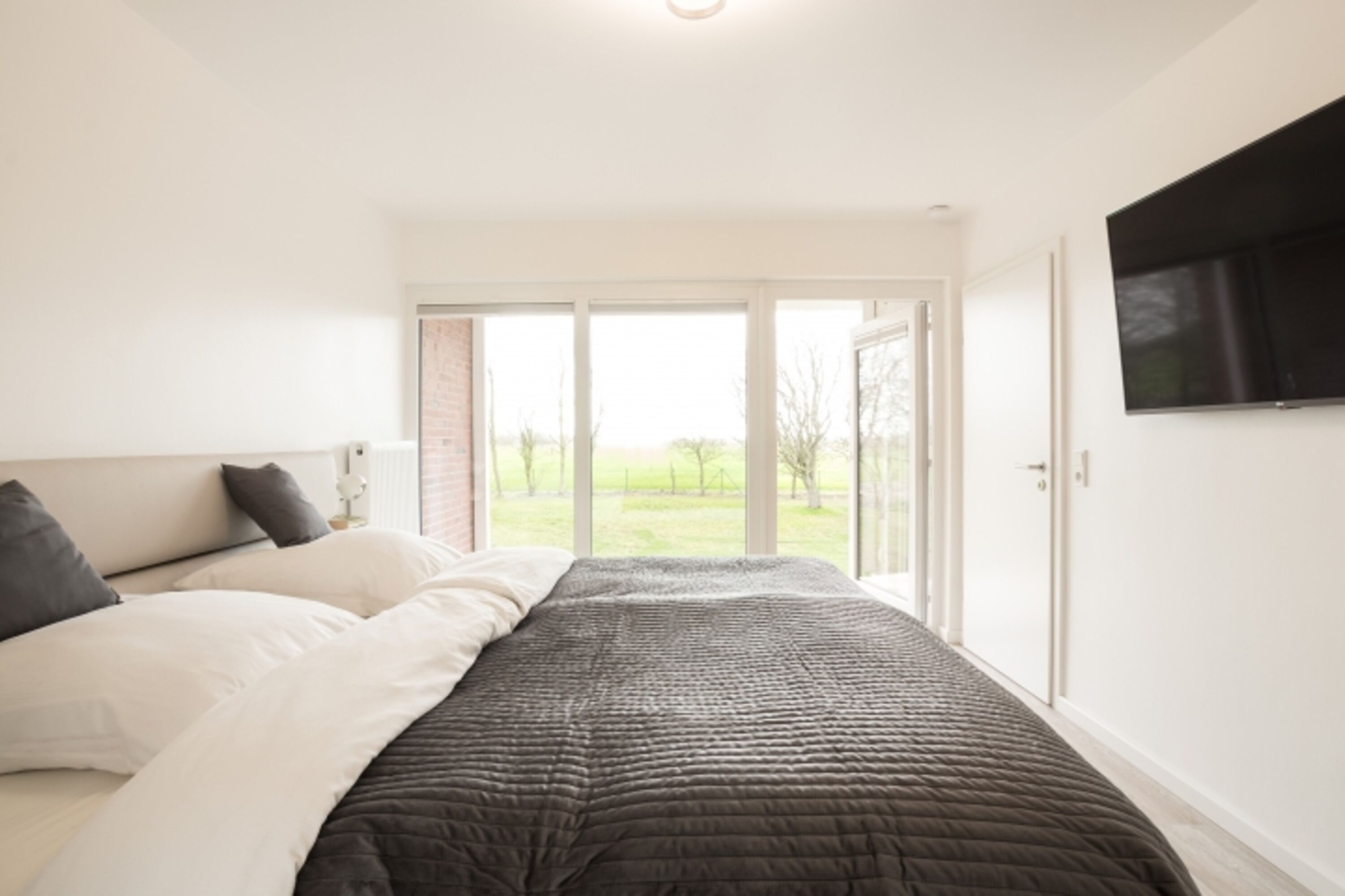 Schlafzimmer mit Blick zum Deich - 1. Stockwerk