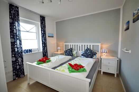 Schlafzimmer mit Doppelbett