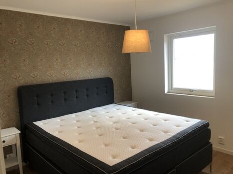 Schlafzimmer mit Doppelbett