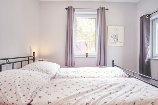 Schlafzimmer mit Doppelbett