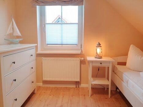 das Einzelbettzimmer