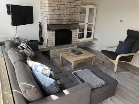 Wohnzimmer mit Kamin