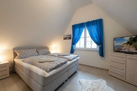 Schlafzimmer 1 mit Doppelbett