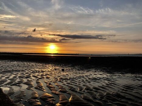 Sonnenuntergang bei Ebbe