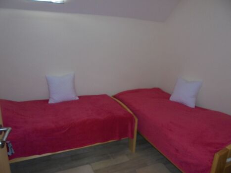 Schlafzimmer mit Einzelbetten