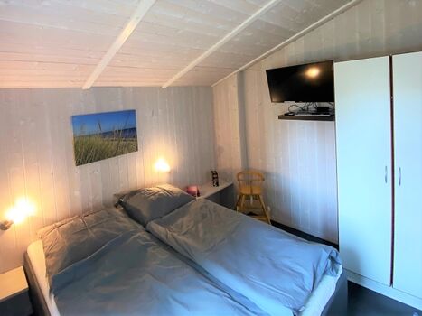 Schlafzimmer mit Doppelbett