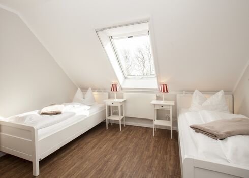 Schlafzimmer mit Einzelbetten