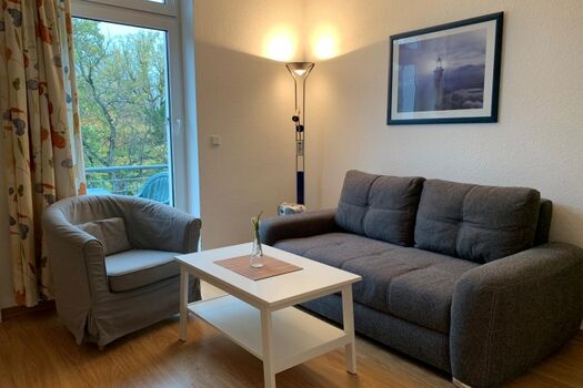 Wohnzimmer mit Schlafsofa