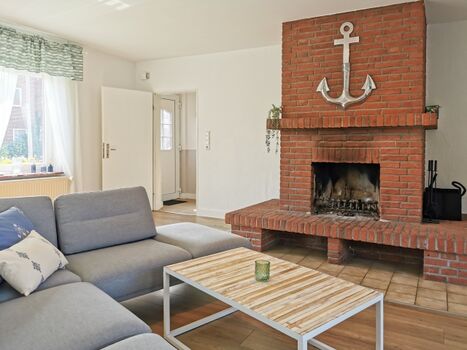 Wohnzimmer mit Kamin 