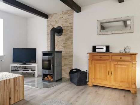 Wohnbereich unten mit Kamin 