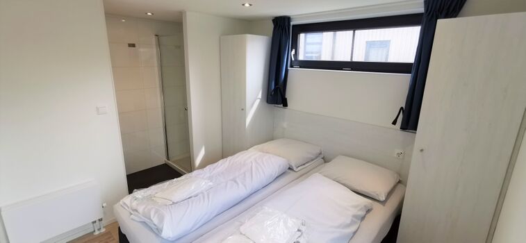 Schlafzimmer 1 mit Bad ensuite