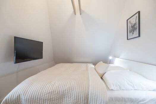 Ferien unter Reet - Eines der zwei Schlafzimmer im Obergeschoss 