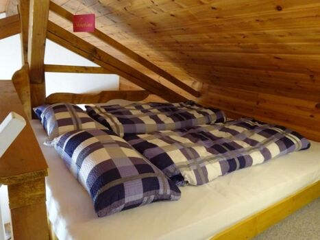 Doppelbett auf der Galerie