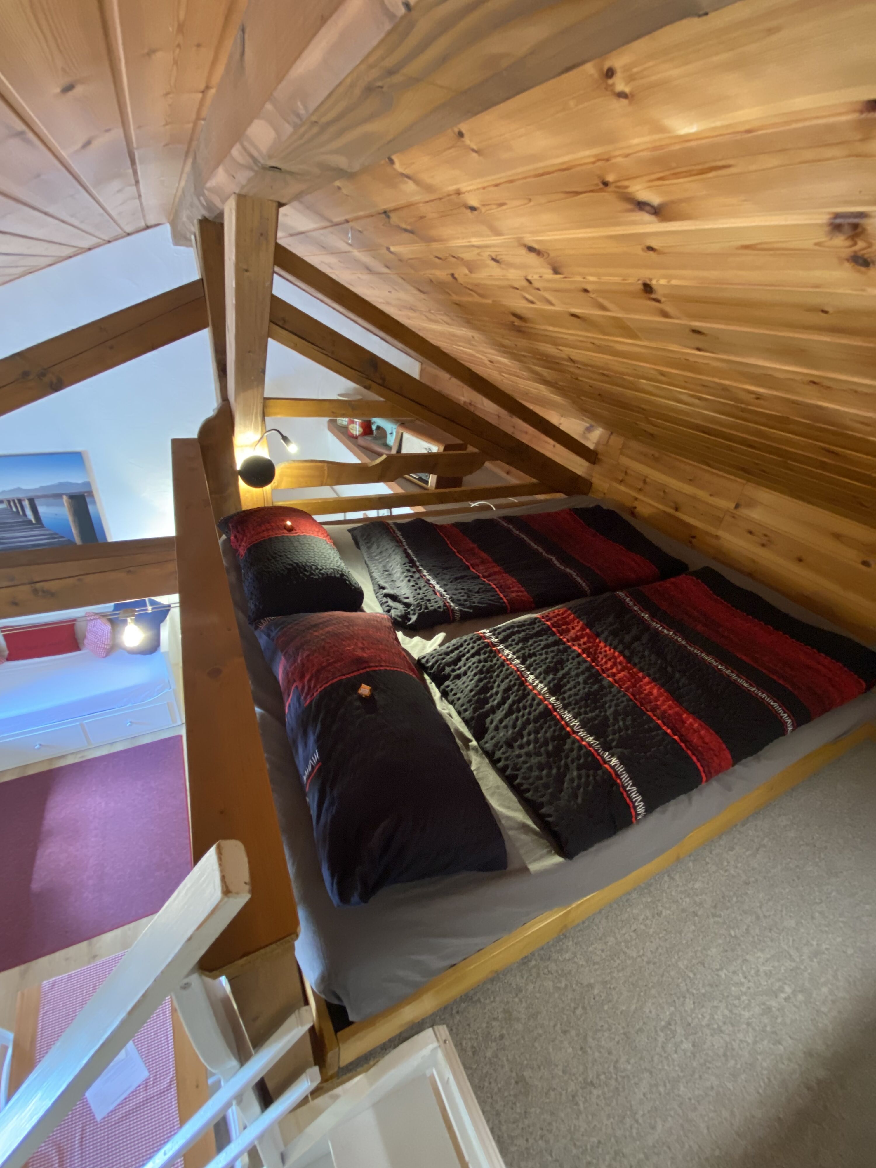 Doppelbett auf der Galerie