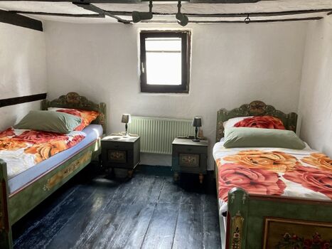 Schlafzimmer mit 2 Einzelbetten 1. OG