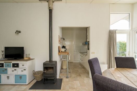 Wohnzimmer mit gemütlichem Kaminofen