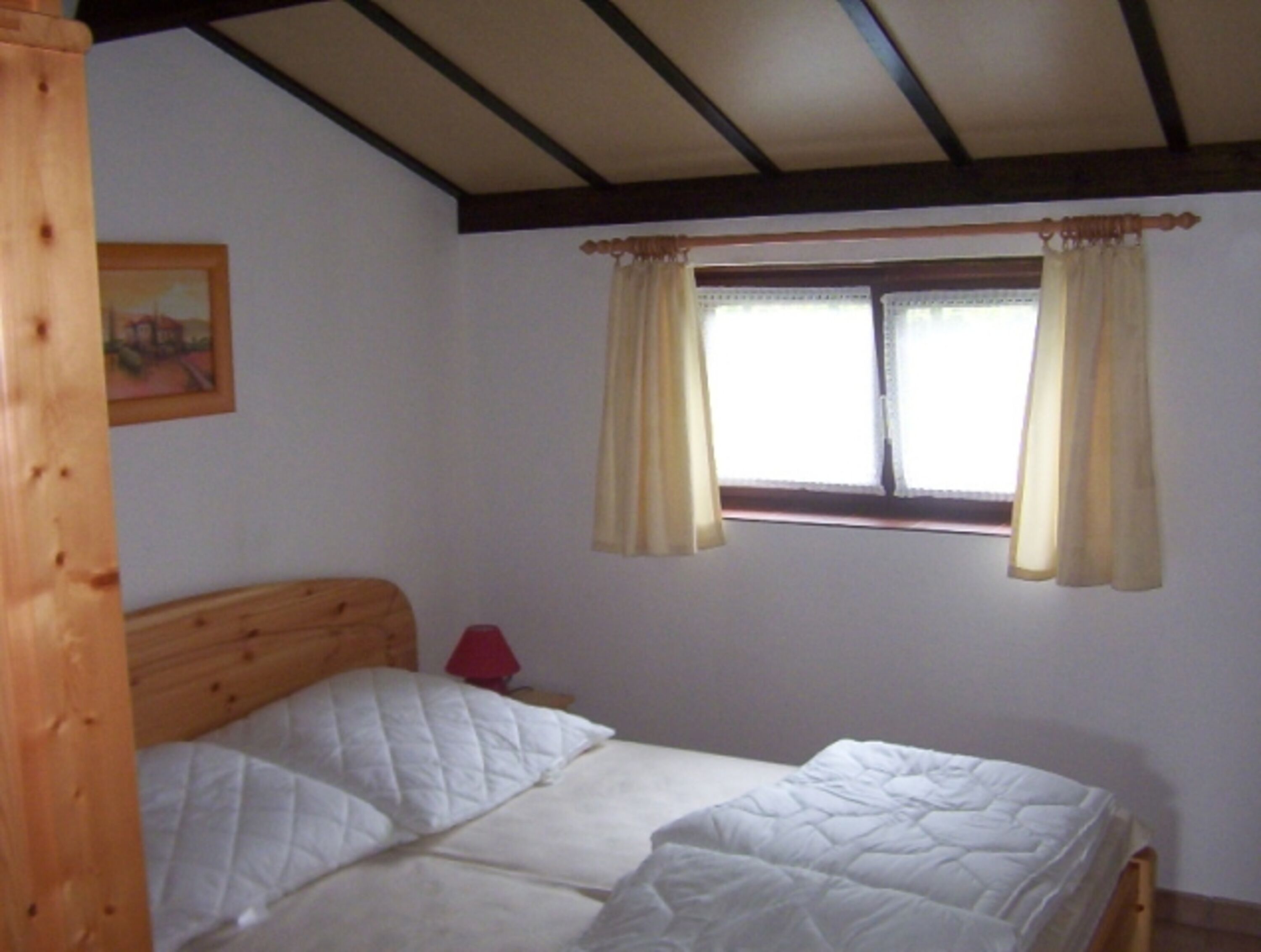 Schlafzimmer mit Doppelbett