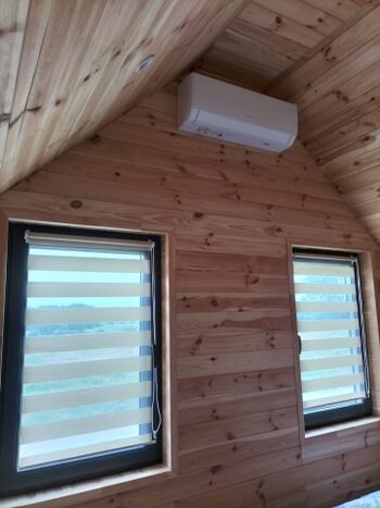  Schlafzimmer 1 mit TV und Klimaanlage  