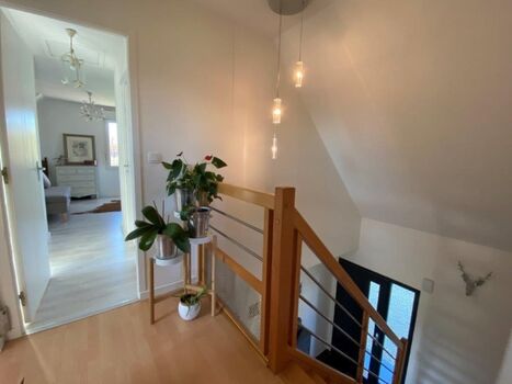 Hier geht es zum großen en suite Schlafzimmer