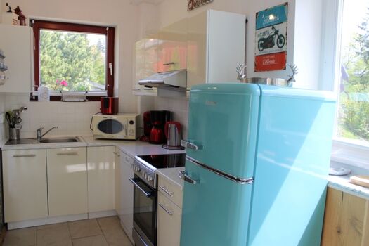 offene Küche mit voller Ausstattung