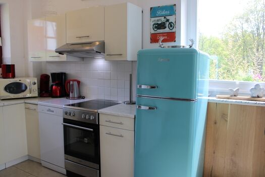 offene Küche mit voller Ausstattung