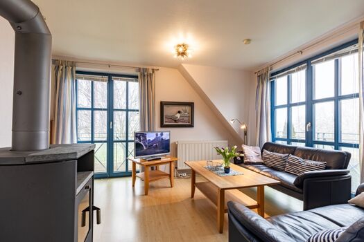 Wohnzimmer mit Kamin