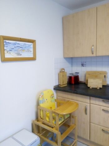 Kinderhochstuhl in der Küche