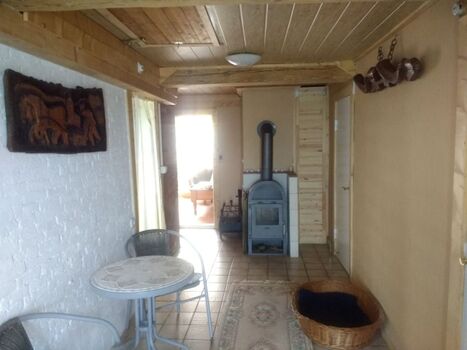 im Flur freut sich der Ofen auf die gemütliche Winterzeit