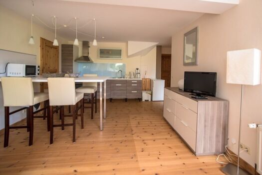 Wohnzimmer mit Küche