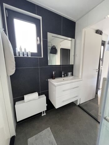 Badezimmer 'en suite' zwischen den beiden SZ