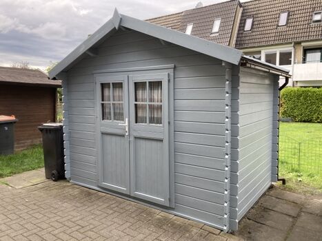 Holzhütte für Fahrräder und Bollerwagen 