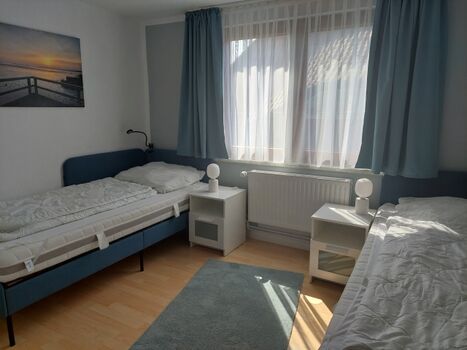 Schlafzimmer mit 2 Einzelbetten