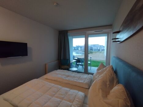 Schlafzimmer mit Hafenblick