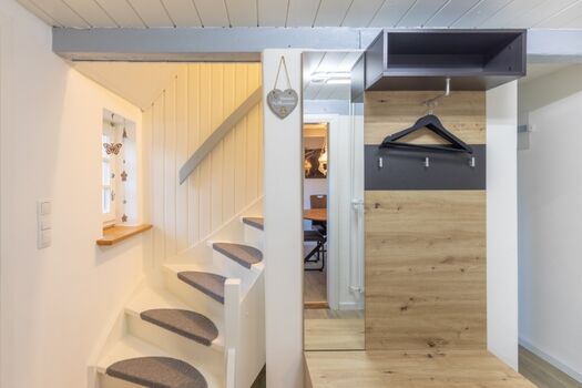 Räidehus - Treppenaufgang ins Obergeschoss 