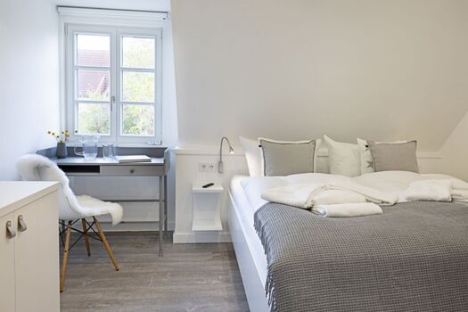 Schlafzimmer eins im 1 OG