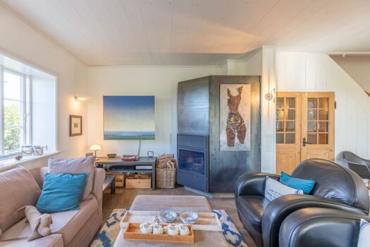 Andrea - Gemütliches Wohnzimmer mit tollem Kamin und großem Flat-TV