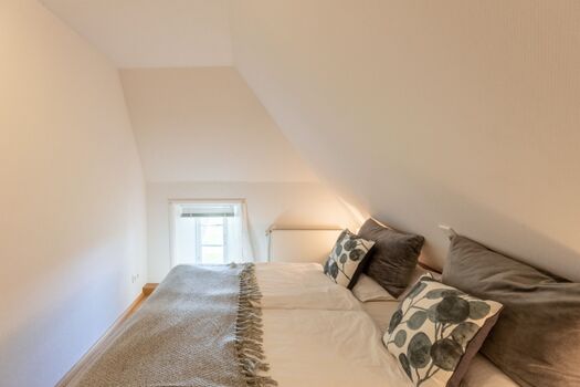 Andrea - Kleines Schlafzimmer mit Doppelbett