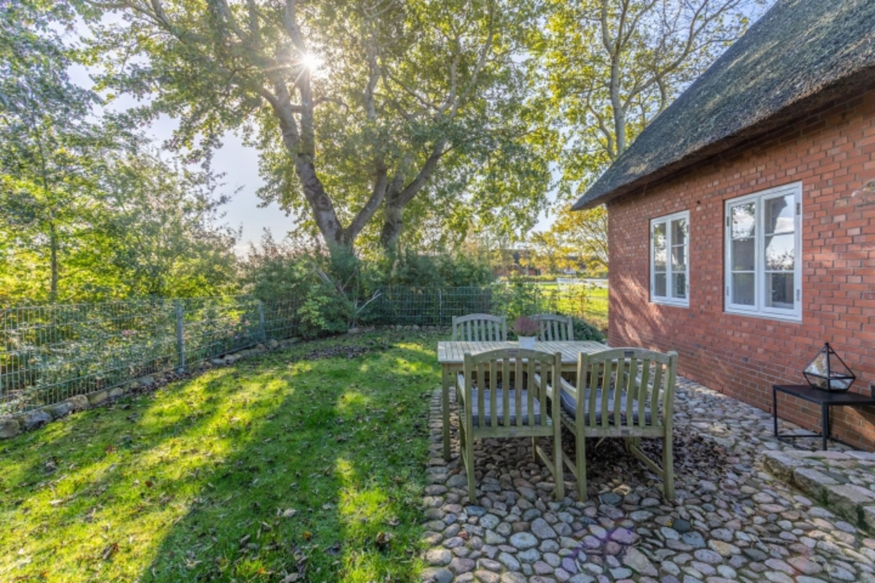 Andrea - Eingezäunter Garten 