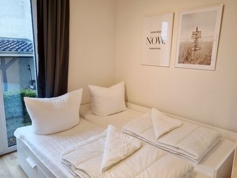 das Einzelbett zum Doppelbett umgebaut