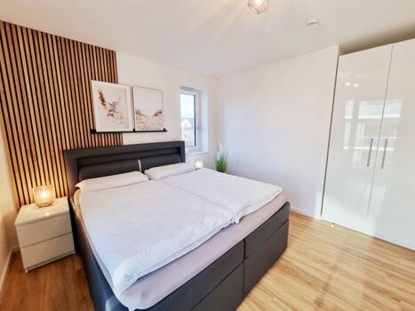 das Doppelbettschlafzimmer