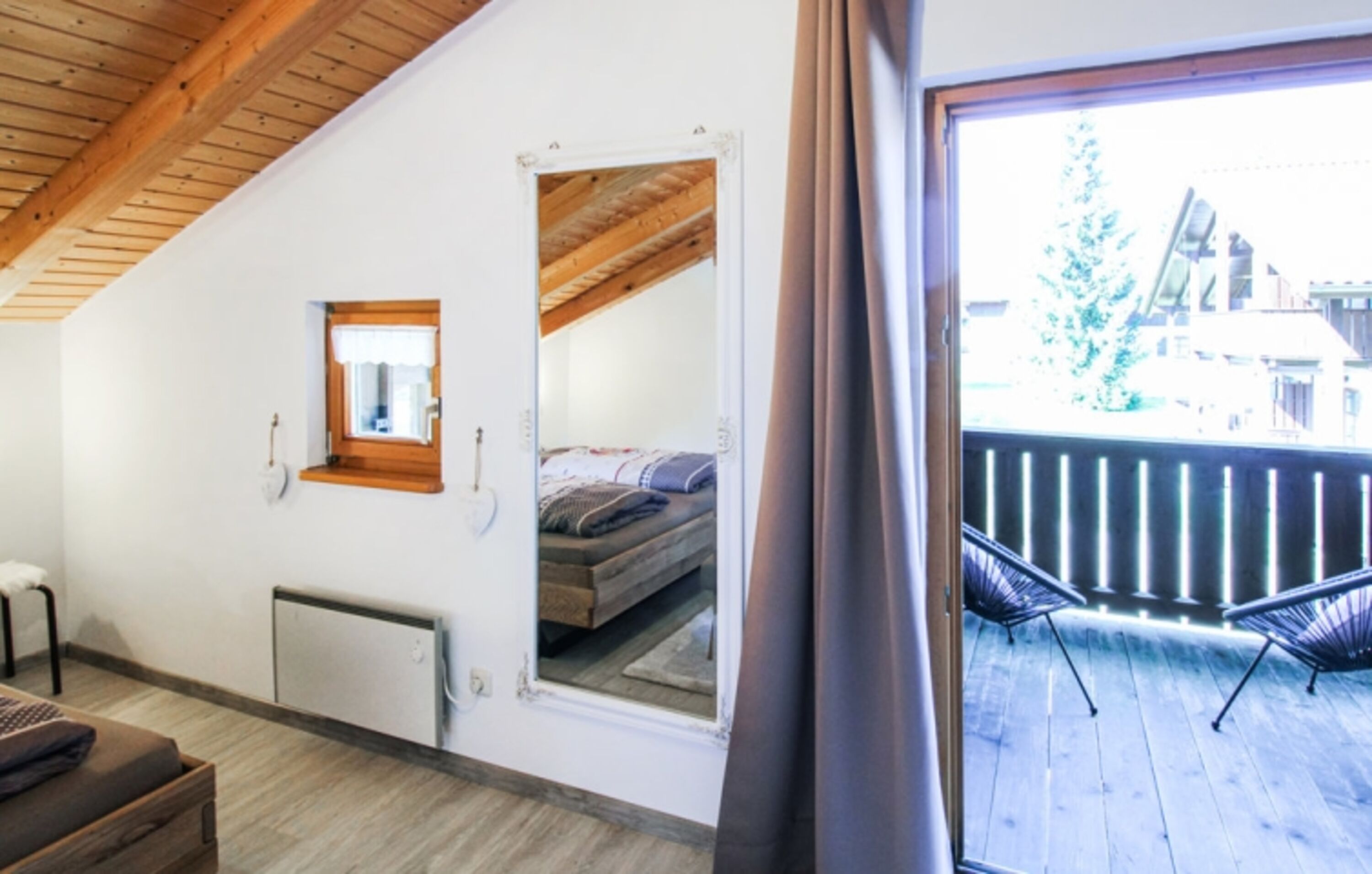 Schlafzimmer mit Balkon