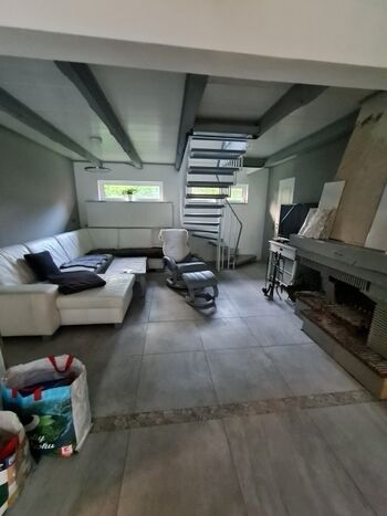 Wohnzimmer mit Kamin