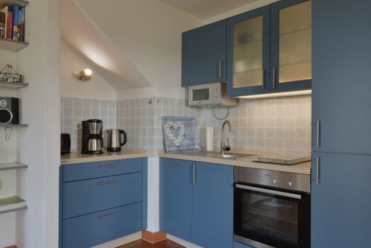 Die Küche mit guter Aussstattung und eigenem Gefrierschrank