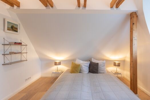 Deichwärterkate - Schlafzimmer mit großem Doppelbett 