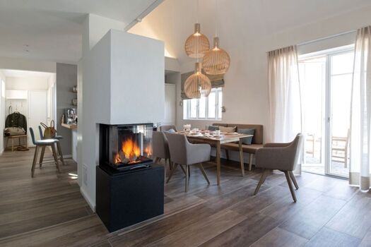 Mittelpunkt des Hauses ist der gemütliche Kaminofen