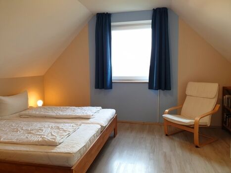 das Doppelbettzimmer