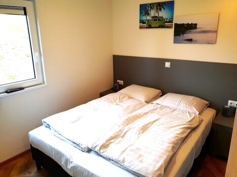 Schlafzimmer 1 ausgestattet mit Boxspringbetten Doppelzimmer