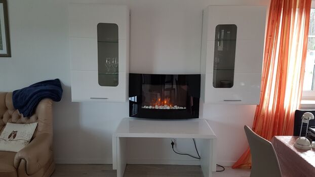 Wohnzimmer mit Elektrokamin