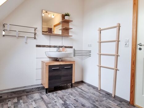 das Duschbad mit Fenster