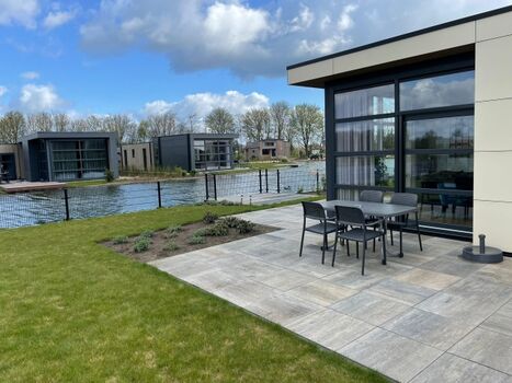 Unser Chalet "Aan het Water" mit tollem eingezäunten Gartengrundstück